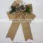 jute christmas bowknots with pines and pinecones