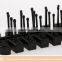 Black folding plastic hair comb