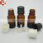 China wholesale e-liquid small empty amber glass bottle with tamper evident seal