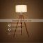 Industrial style Handle floor lamp in black tripod wood material