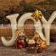 Nativity set religious art word "JOY"