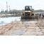 Ground reinforcement mats and dispensers for temporary roads
