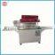 Economical skin packaging machine for hardware parts with out-feed table