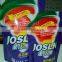 liquid detergent standing pouch with handle and spout