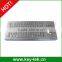 Desk top keyboard with stainless steel trackball