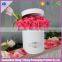 White keepsake paperboard round flower hat box with hands