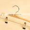 Hot sale laminated wooden clothes hanger with metal clips