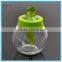 ball shaped clear glass body with color lid oil vinegar bottle