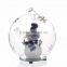 clear glass ball with snow man wear scarf inside