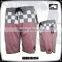OEM apparel 100% polyester skull printed cheap surf board shorts