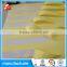 SELF ADHESIVE CAST COSTED PAPER WITH YELLOW RELEASE PAPER