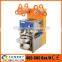 New tpye semi-automatic plastic rotary water cup filling sealing lid machine