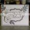 Gorgeous & elegant white embossed rose & leaves accent wedding invitation with silver border
