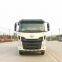 Hook arm garbage truck
