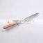 Tooth shaped uncapping knife with knife toe turning up