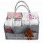 diaper caddy with shoulder belt trim leather pocket edge