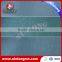 Woodpulp creped spulace nonwoven fabric cleaning cloth