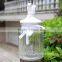 Glass storage jar with white decorative ceramic squirrel lid