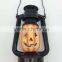 pumpkin looking hurricane lantern for All Saints' Day