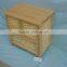 wooden storage cabinet with natural wicker basket drawer