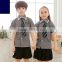 custom nice latest design boys and girls school uniform shirts wholesale