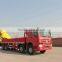 howo 8*4 30T crane truck gets up with the heavy and transport vehicle truck with loading crane