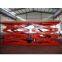 Stationary scissor hydraulic lift platform for material handing and transportation
