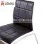 Square wooden table and leather chairs