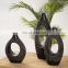 New arrival high quality hotel family bedroom decoration creative carving through design black resin vase