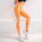 Latest sexy peach hip high waist yoga pants women's fitness pants knitted  seamless hollow breathable yoga clothing