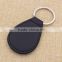 Oval black leather keychain/blank metal car keychain custom unique logo                        
                                                                                Supplier's Choice