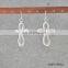 Worn goldworn silver knot earring