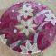 Magenta color round rug for Cigar Room