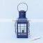 Iron Chief's Oil Lamp Blue beach-style-outdoor-table- 1840