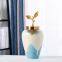 American Luxury Hand Made White Blue Ceramic Vase With Metal Cap For Showroom Decor