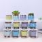 Hot selling flowerpots for small, fresh, succulent plants with colorful holes and feet