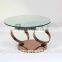 Glass top table with stainless steel leg