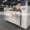 Semi-automatic corrugated paperboard carton stitching machine