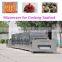 continouous conveyor type microwave oven for cooking shellfish