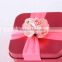 square metal with rose ribbon/gift box