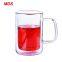 Hand made high borosilicate glass dual cup with handle wholesale