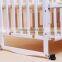 White multifunctional baby crib