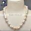 cream white 11-13mm AAA grade nucleated baroque pearls string wholesale