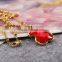 Guangzhou biggest wholesale fashionable gold long chain red crystal necklace with bear pendant