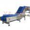 Material handling bucket conveyor with side guard and flight