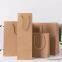 Yellow kraft paper shopping bag with string