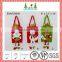 Green and red color christmas gift bag