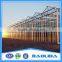 Prefabricated structure Galvanized Steel Structure Glass Covering Greenhouse for sale