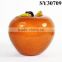 Small orange glazed ceramic pear shape fruit decoration