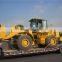 Японский погрузчик на колесах Caterpillar 966H осуществляет погрузку, фронтальный погрузчик CAT 966H отправляется в порт